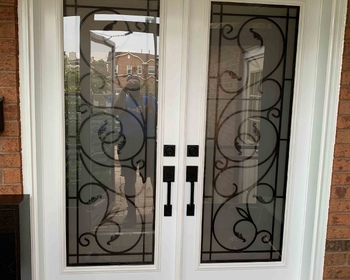 Double-door-with-large-wrought-iron-glass_5067.jpg