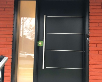 Wide-front-door-with-steel-lines.jpg