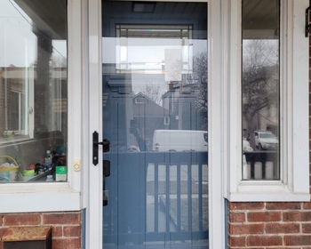 Victoria-blue-front-door-with-storm-door.JPG