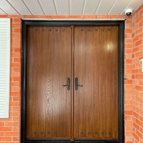 Fiberglass double door with nailheads