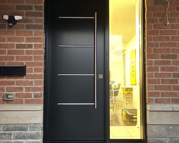 Front-8'-steel-Vog-door-with-steel-accents-and-clear-sidelite.jpg