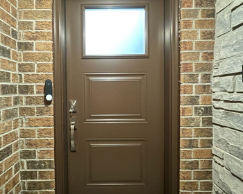 Brown steel Sydney door with top glass