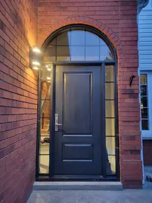 Black-fiberglass-door-with-round-transom.jpg