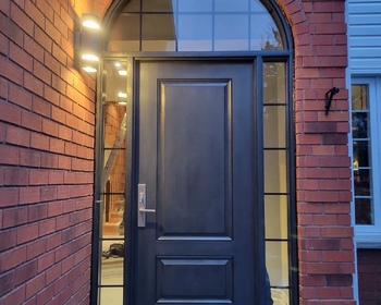 Black-fiberglass-door-with-round-transom.jpg