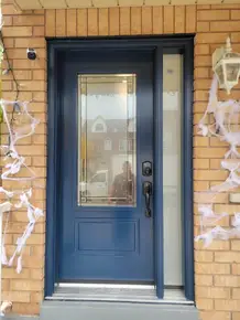 Blue steel Soho door with 22x48- Design glass and frosted glass sidelites.JPG