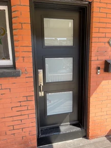 Contemporary black single front door with 3 x glass inserts.jpg