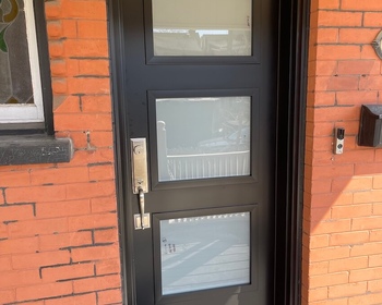 Contemporary black single front door with 3 x glass inserts.jpg