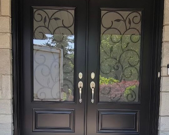 Front double door with 22x64- wrought iron glass.jpg