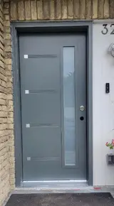 Grey steel Oso door with steel accents and 7x64- frosted glass.jpg