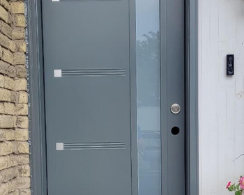 Grey steel Oso door with steel accents and 7x64- frosted glass.jpg