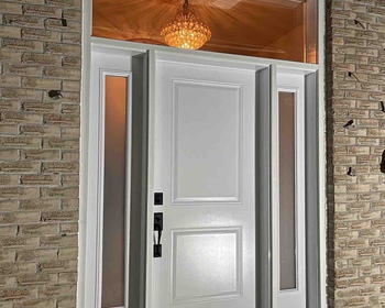 Steel white London entry door with 7x64- frosted glass sidelites and clear glass transom.jpg