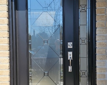 Black-single-door-with-22x64-inches-Waterdown-glass-and-7x64-inches-Waterdown-glass-sidelite.JPEG