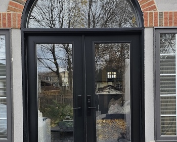 French-black-door-with-arched-transom.JPG