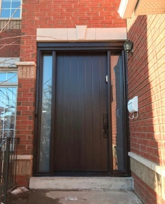Plank style fiberglass door with sidelites.JPG