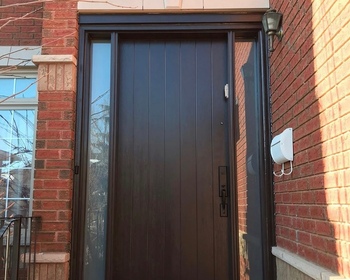Plank style fiberglass door with sidelites.JPG