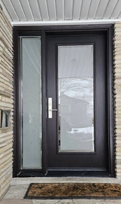 Black fiberglass door with full size frosted glass and sidelite.jpg