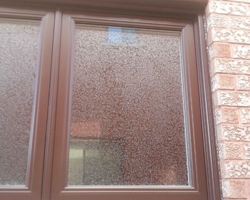 Casement Window Brown Privacy Glass Brick to Brick Toronto