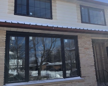 Black-offset-windows-with-cross-grills.jpg