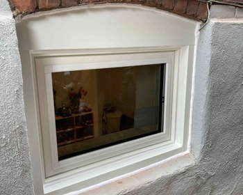 Basement Hopper Window, outside view