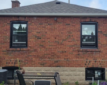 Retrofit installation of Black single hung and single sliders in windows in East York.jpg