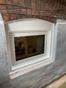 Basement Hopper Window, outside view