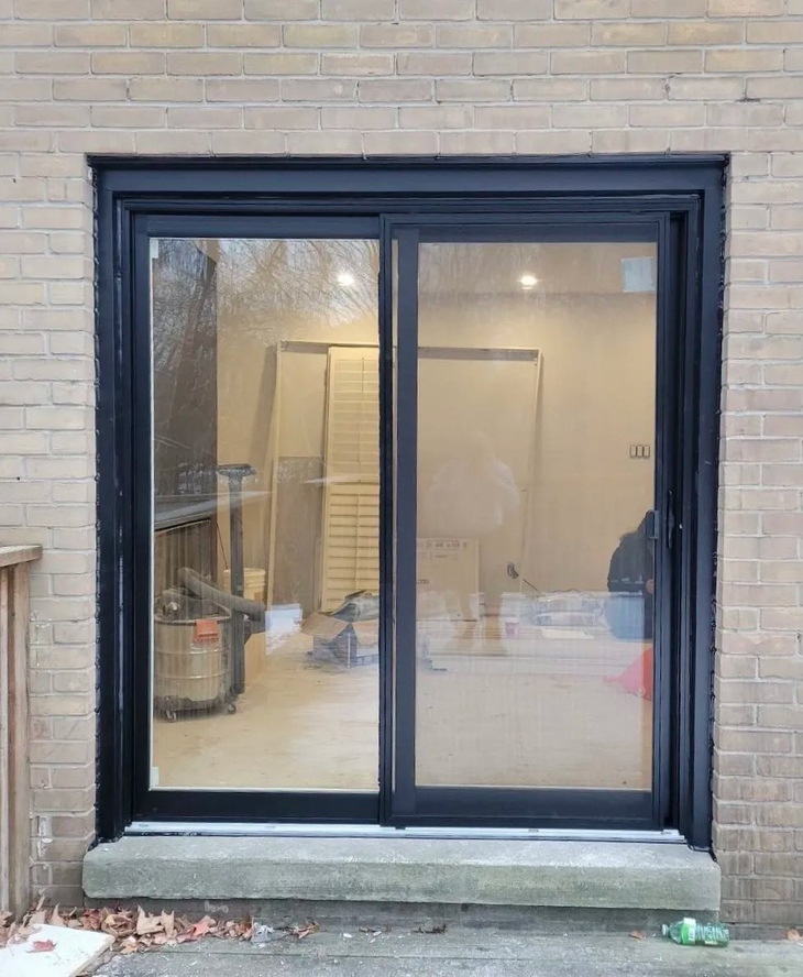 Standard sliding patio door size in Canada showing 6 foot wide glass door installation