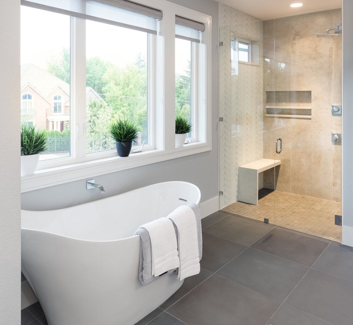 Bathroom windows providing natural light ventilation and privacy in modern bathroom interior