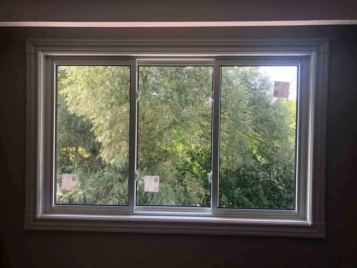 Sliding bathroom window design for small space and limited clearance