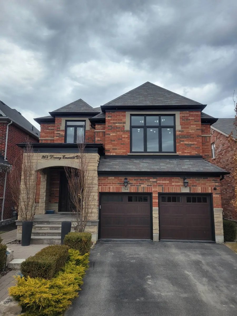 Custom replacement windows with transom design in Toronto home